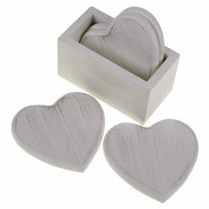 Set of 4 white heart shaped wooden coasters in wood holder