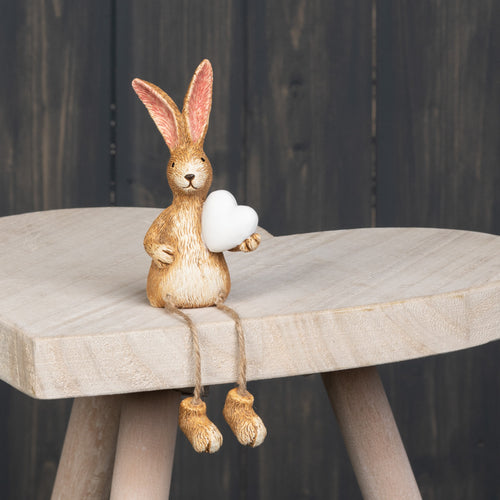 Dangly leg Rabbit holding white heart