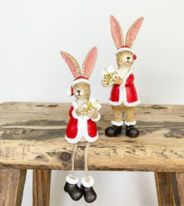 Santa Bunny holding Present