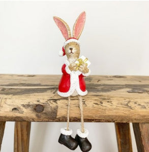 Santa Bunny holding Present