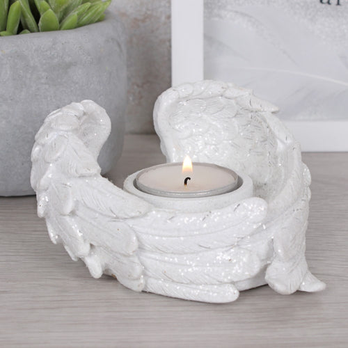Pair of sparkly angel wings with tea light holder