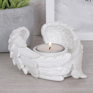Pair of sparkly angel wings with tea light holder