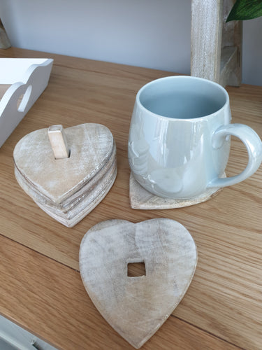 Natural wood heart shaped coasters