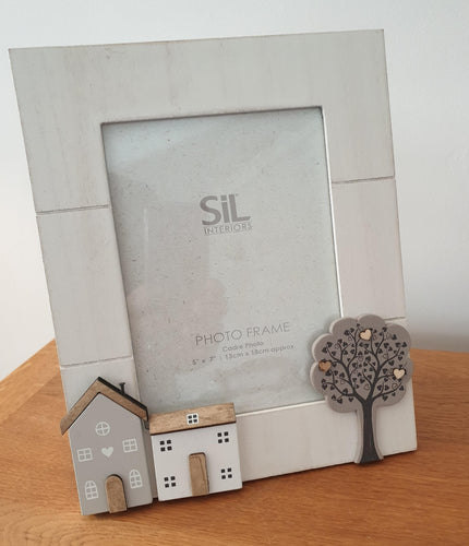 Wooden house and tree Frame