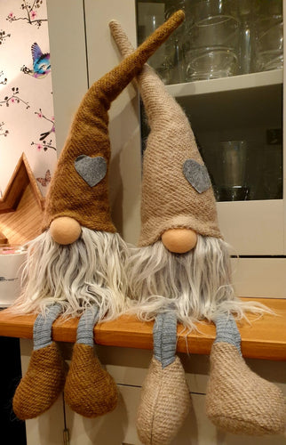 Large beige or brown furry gonk with heart on hats