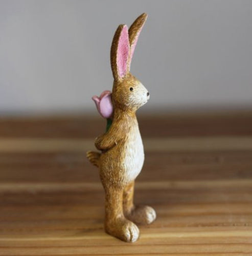 Standing Bunny holding Pink Rose